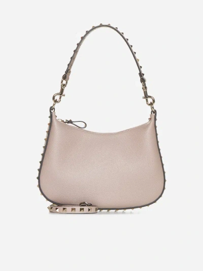 Shop Valentino Rockstud Leather Small Hobo Bag In Poudre