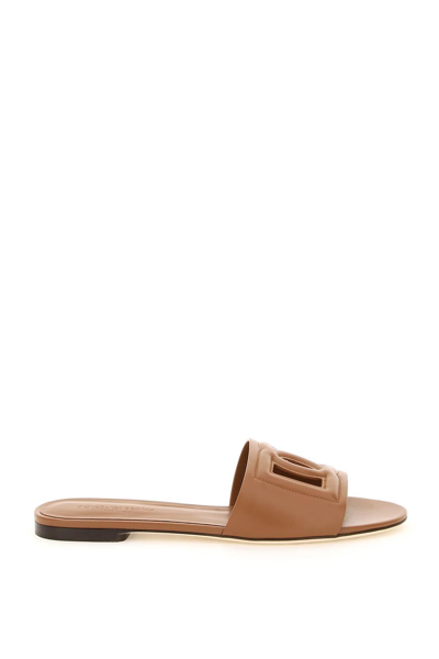 Shop Dolce & Gabbana Leather Slides With Cut-out Logo In Brown