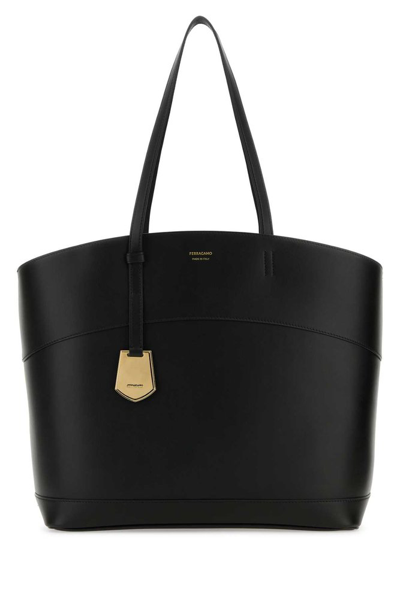 Shop Ferragamo Salvatore  Charming Logo Printed Top Handle Bag In Black