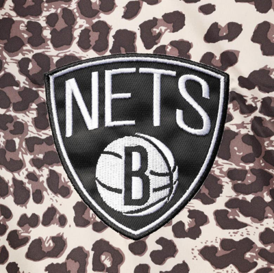 Shop G-iii Sports By Carl Banks Dkny Sport Leopard Brooklyn Nets Gabriella Windbreaker Half-zip Hoodie