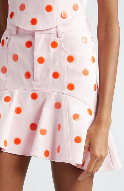 Shop Area Polka Dot Ruffle Denim Miniskirt In Powder Pink