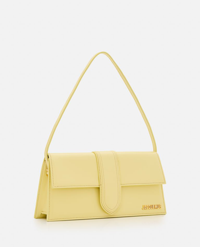 Shop Jacquemus Le Bambino Long Leather Shoulder Bag In Yellow