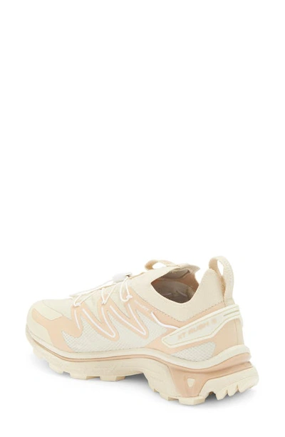 Shop Salomon Xt-rush 2 Sneaker In Bleached Sand/ Hzlnut/ Wht