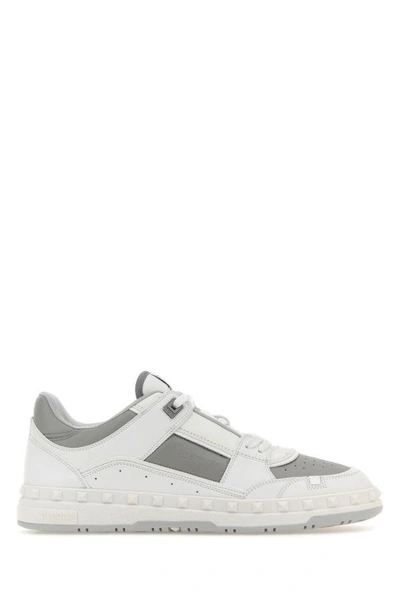 Shop Valentino Garavani Man Two-tone Leather Freedots Sneakers In Multicolor