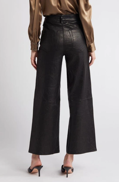 Shop Frame Slim High Waist Wide Leg Crop Leather Pants In Black