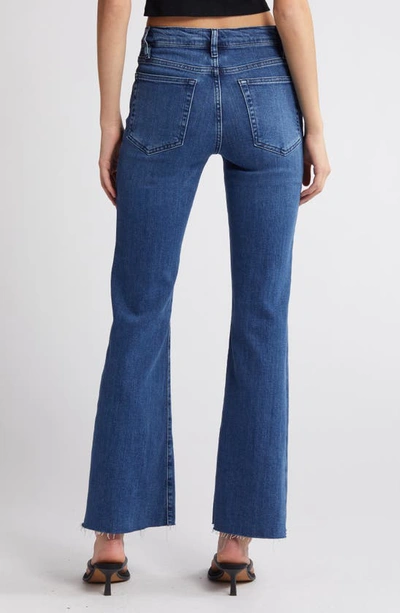 Shop Frame Le Easy Raw Hem Flare Jeans In Temple