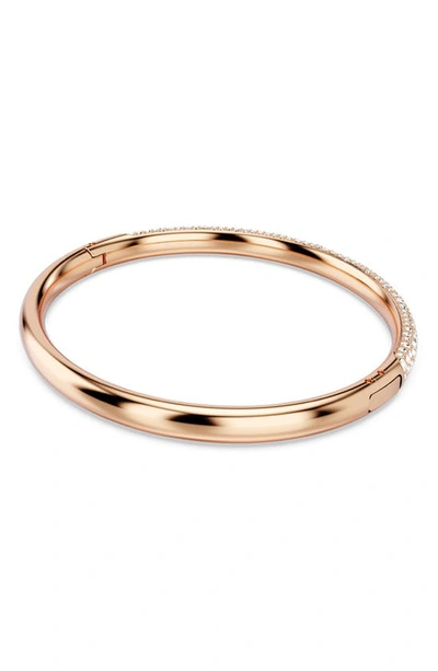 Shop Swarovski Meteora Hinge Bangle In Rose Gold