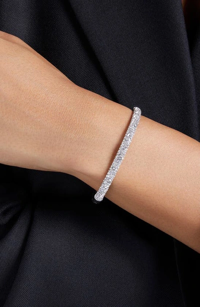 Shop Swarovski Meteora Hinge Bangle In Silver