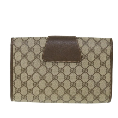 Shop Gucci Gg Canvas Beige Canvas Clutch Bag ()