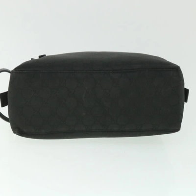 Shop Gucci Gg Canvas Black Canvas Clutch Bag ()