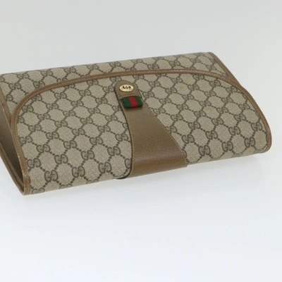 Shop Gucci Gg Supreme Beige Canvas Clutch Bag ()