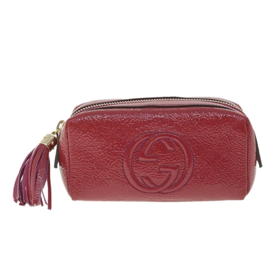 Shop Gucci Interlocking G Pink Patent Leather Clutch Bag ()