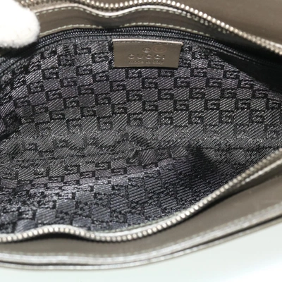 Shop Gucci Khaki Canvas Clutch Bag ()