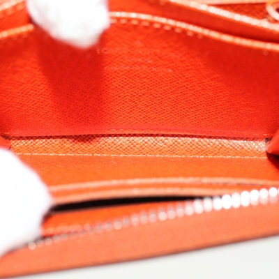 Pre-owned Louis Vuitton Porte Monnaie Zippy Orange Leather Wallet  ()