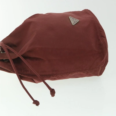 Shop Prada Burgundy Synthetic Clutch Bag () In Red