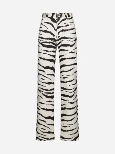 Shop Alaïa Zebra Print Jeans In Cream,black