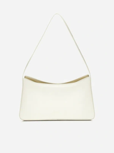 Shop Aesther Ekme Soft Baguette Leather Bag In Cream