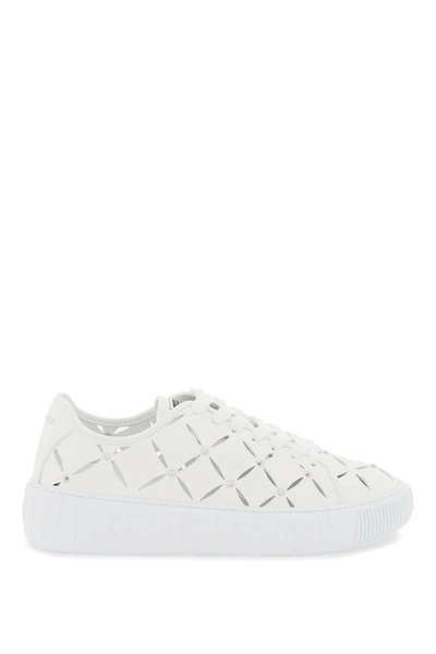 Shop Versace Greca Cut-out Sneakers In Optical White Palladium (white)
