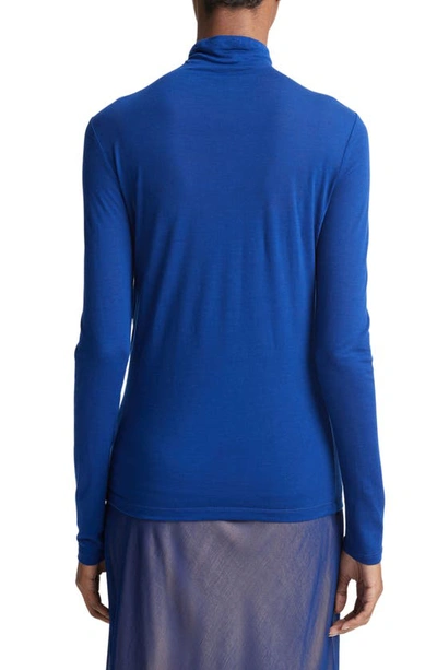 Shop Vince Long Sleeve Turtleneck Top In Caspian