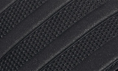 Shop Adidas Originals Gender Inclusive Adilette Comfort Sport Slide Sandal In Black/ Black/ Black