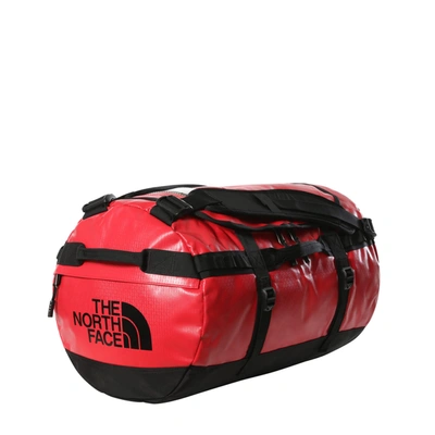 Shop The North Face Base Camp Duffel In Red