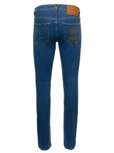 Shop Versace Blue Fitted Jeans With Logo Embroidered And Botton In Cotton Blend Denim Woman