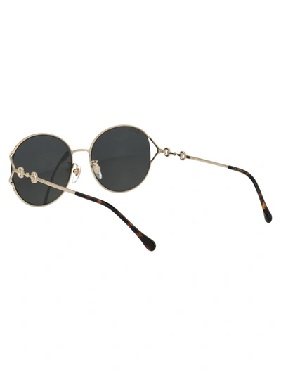 Shop Gucci Sunglasses In 001 Gold Gold Grey