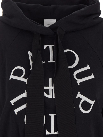 Shop Patou Cropped Medallion Logo Sweatshirt In Black
