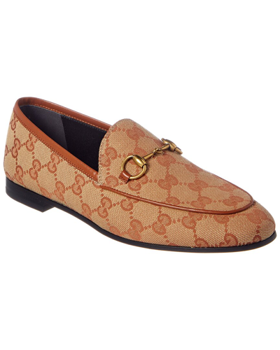 Shop Gucci Jordaan Gg Canvas Loafer In Brown