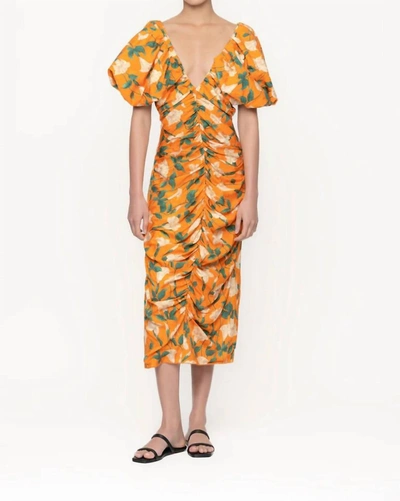 Shop Agua Bendita Camelia Sabanero Dorado Midi Dress In Orange Floral In Multi