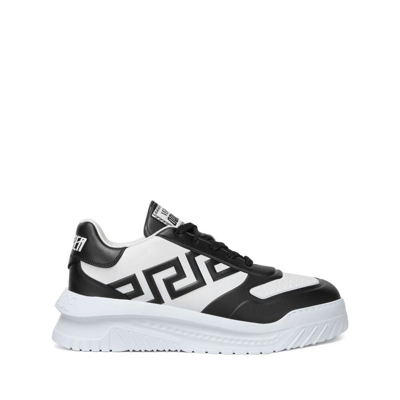 Shop Versace Sneakers In Black/white