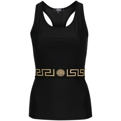 Shop Versace T-shirts In Black/gold