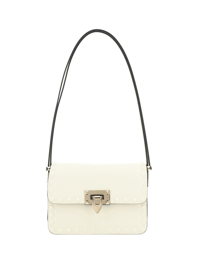 Shop Valentino Garavani Rockstud Foldover Top Shoulder Bag In White