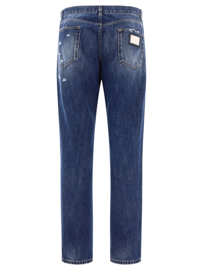 Shop Dolce & Gabbana Straight Leg Jeans With Ripped Details
