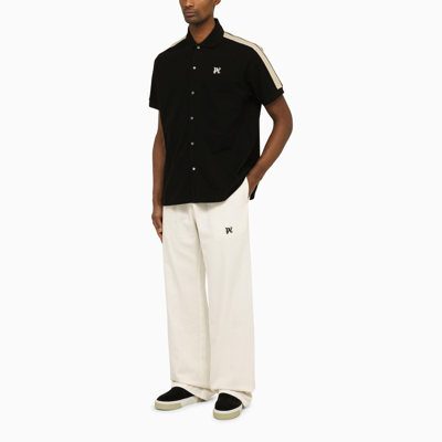 Shop Palm Angels Off White Jogging Trousers With Monogram