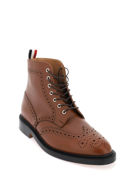 Shop Thom Browne Wingtip Ankle Boots With Brogue Details