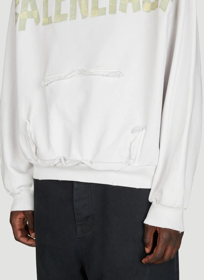 Shop Balenciaga Men Distressed Logo Print Hooded Sweatshirt In White