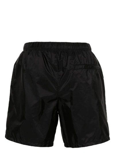 Shop Prada Men Re-nylon Swim Shorts In Black
