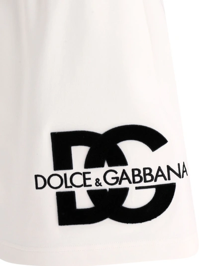 Shop Dolce & Gabbana Jersey Miniskirt With Dg Logo Patch