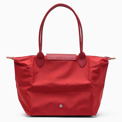 Shop Longchamp Red M Le Pliage Green Bag
