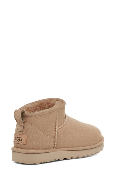 Ugg 10mm Classic Ultra Mini Shearling Boots In Sand