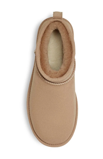 Ugg 10mm Classic Ultra Mini Shearling Boots In Sand