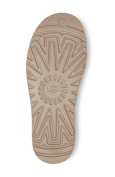 Ugg 10mm Classic Ultra Mini Shearling Boots In Sand