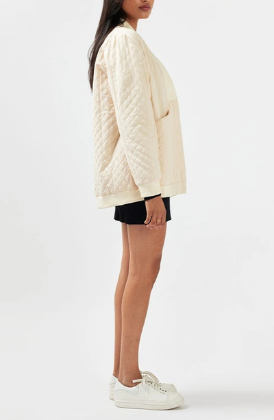 Shop Belle & Bloom Belle And Bloom Over It Oversize Quilted Bomber Jacket In Cream