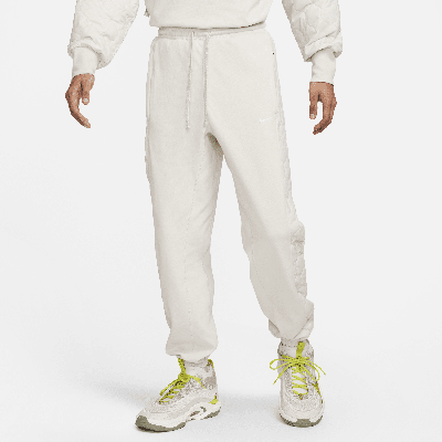 Shop Nike Men's Standard Issue Basketball Pants In Brown