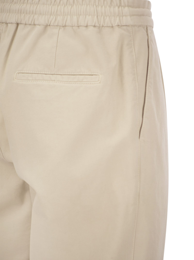 Shop Brunello Cucinelli Leisure Fit Cotton Gabardine Trousers With Drawstring And Double Darts