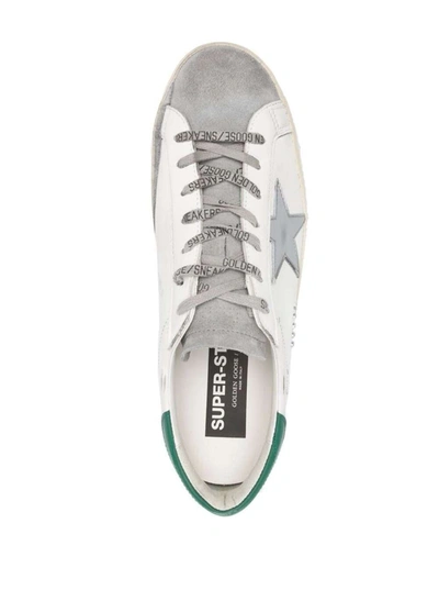 Shop Golden Goose 'superstar' White Vintage Low Top Sneakers With Blue Heel Tab In Leather Man