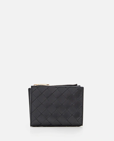 Shop Bottega Veneta Small Bi-fold Leather Zip Wallet In Black