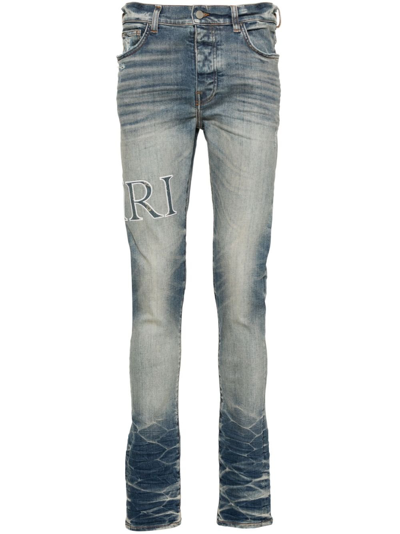 Shop Amiri Logo Print Skinny Jeans - Men's - Cotton/elastane/elastomultiester In Blue