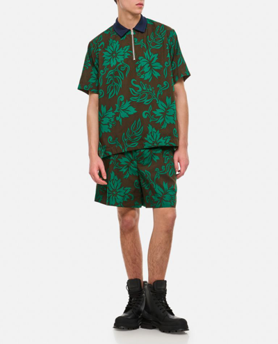 Shop Sacai Floral Print Polo In Green